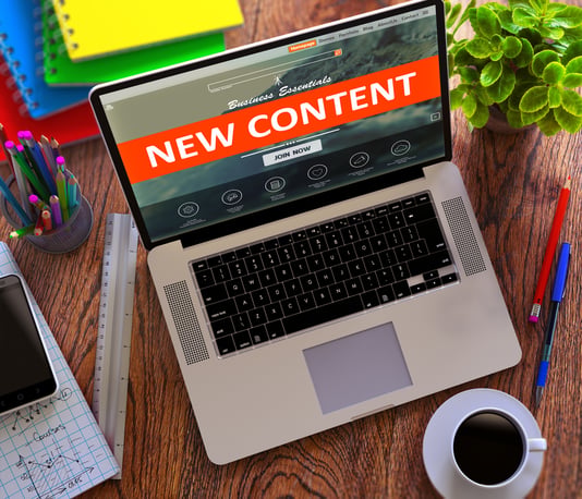 New Content on Laptop Screen. E-commerce Concept.